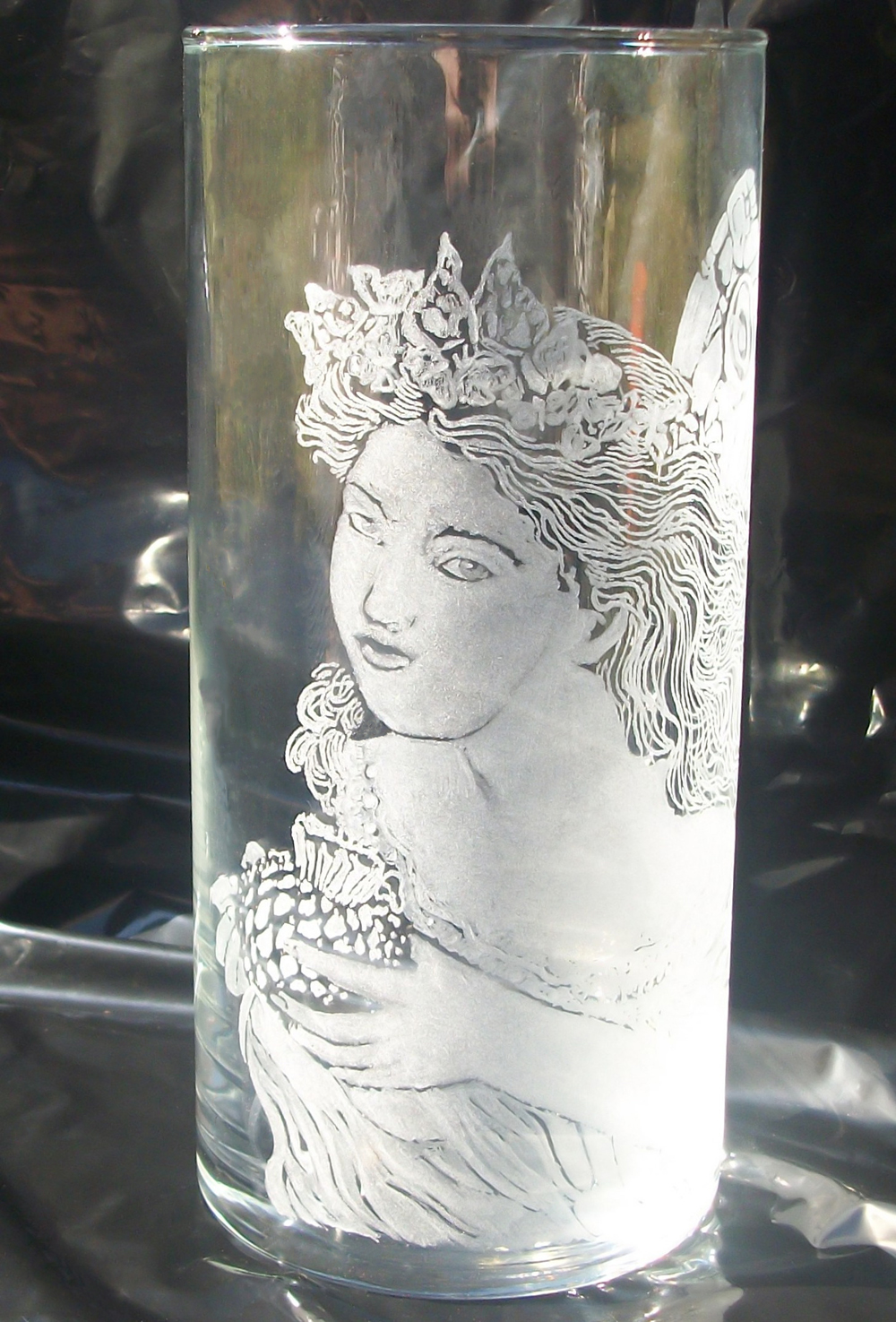 Hand engraved glass fairy vase